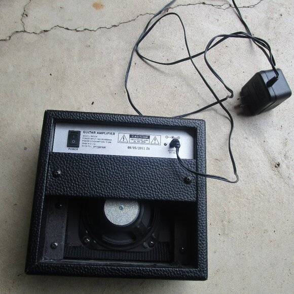 First Act's compact guitar practice amplifier sports a cool, rugged, retro desig - Picture 3 of 3